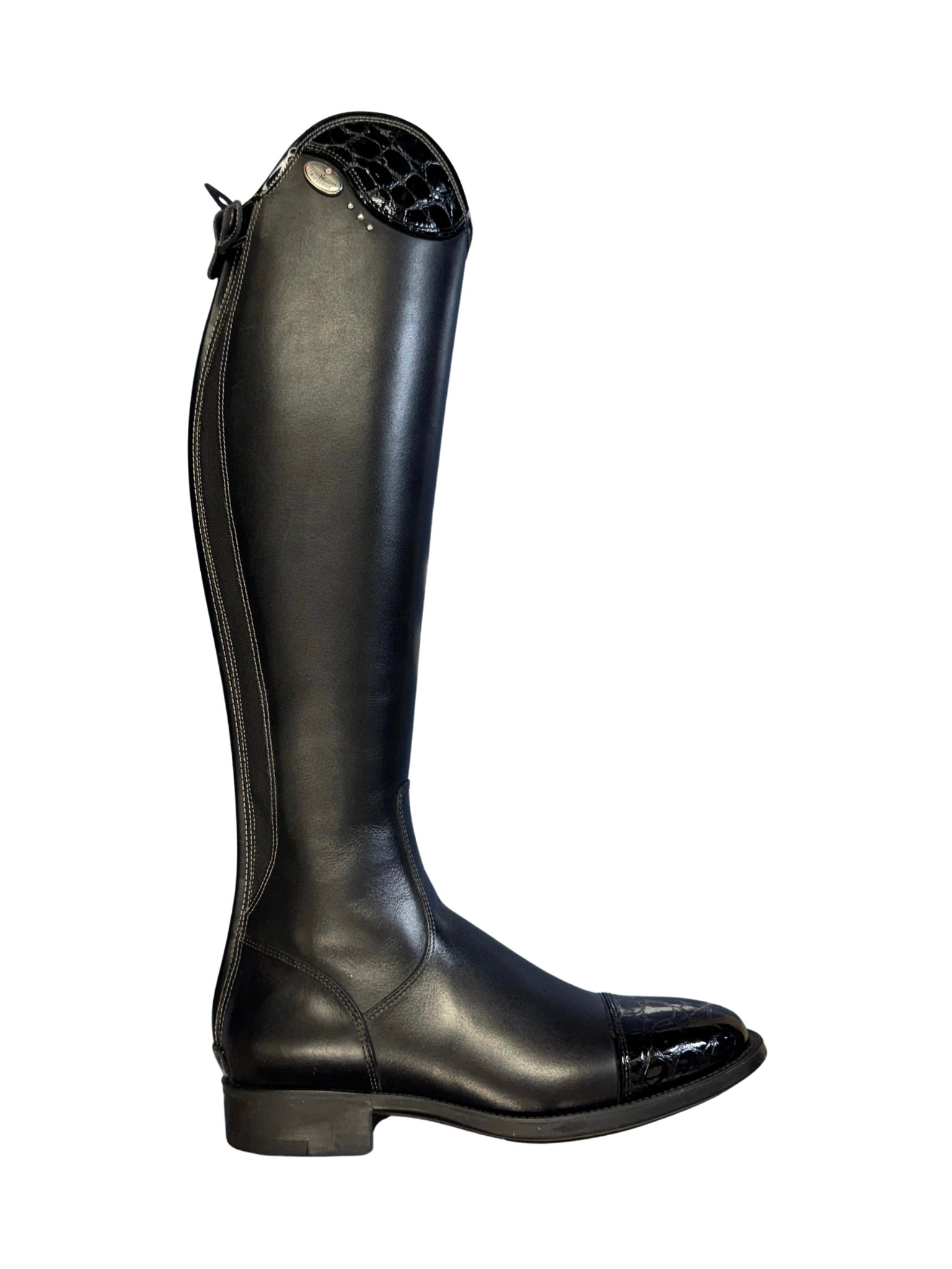 A single black leather knee-high riding boot with a glossy finish, featuring a decorative black crocodile-embossed panel near the top and a low block heel, shown against a plain white background.
