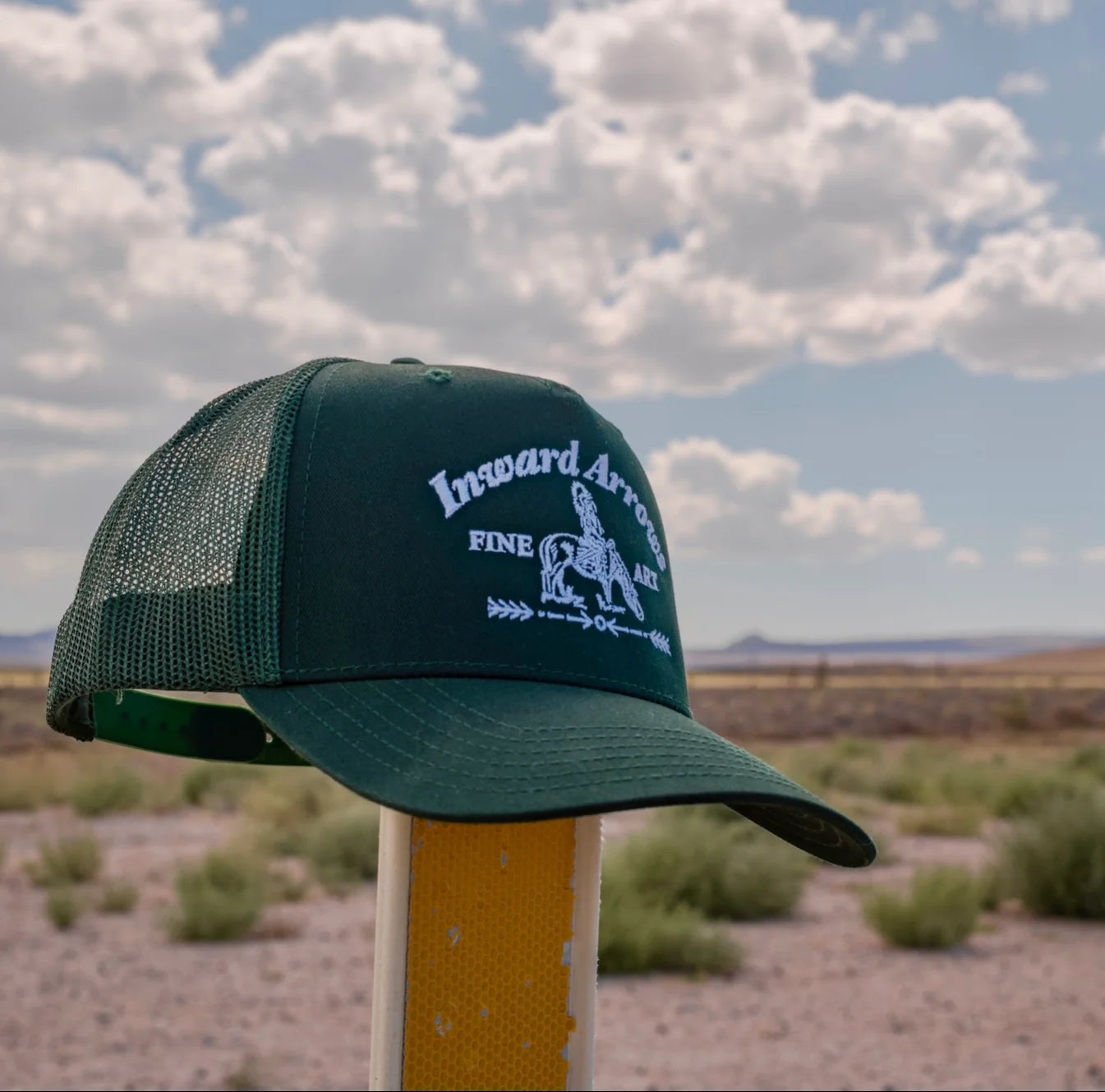 Inward Arrows Many Rains Hat Pine